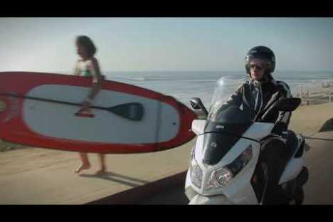 a man carrying a surf board